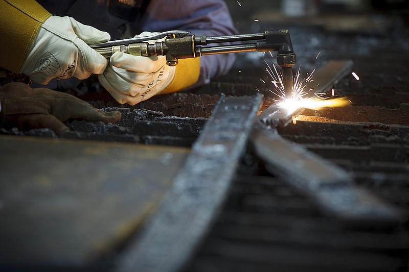 New York Times file photo / Student welders practice their trade in Texas in 2015.