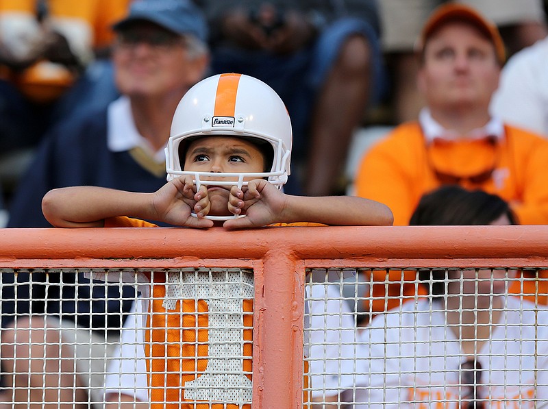 Staff file photo / A young Tennessee football fan watches during the fourth quarter of the Vols' 41-0 loss to Georgia at Neyland Stadium on Sept. 30, 2017.  