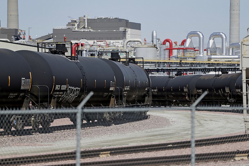 In this April 21, 2020 file photo, ethanol train cars wait outside the Southwest Iowa Renewable Energy plant, an ethanol producer, in Council Bluffs, Iowa. A federal appeals court on Friday, July 2, 2021, threw out a Trump-era Environmental Protection Agency rule change that allowed for the sale of a 15% ethanol gasoline blend in the summer months. (AP Photo/Nati Harnik, File)