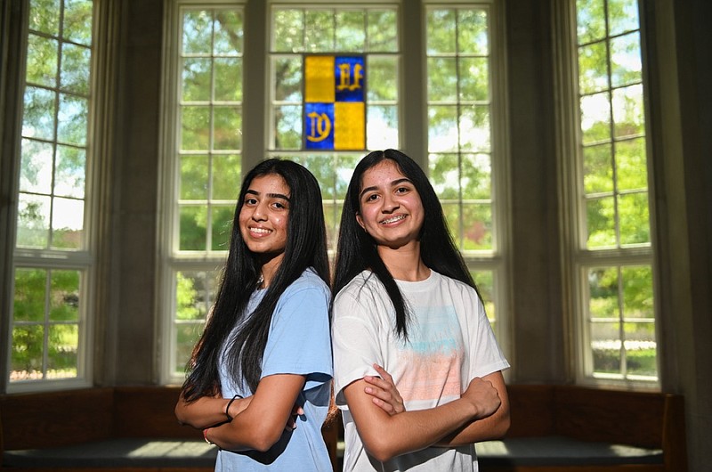 Sisters Shriya, left, and Prisha Purohit are pictured in Guerry Center at the University of Tennessee at Chattanooga. Both sisters are following an early path to college. UTC photo by Angela Foster