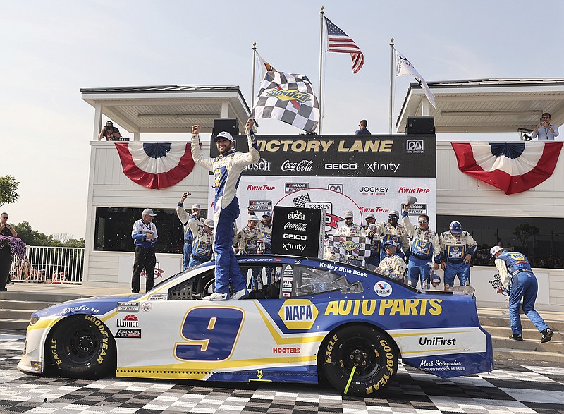 AP photo by Jeffrey Phelps / Hendrick Motorsports driver Chase Elliott celebrates after winning Sunday's NASCAR Cup Series race at Road America in Elkhart Lake, Wis.