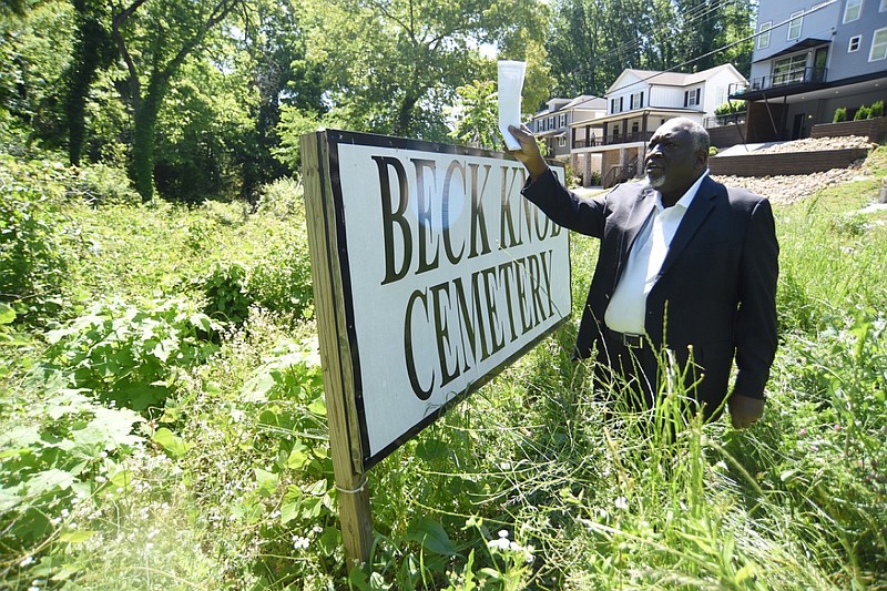 Staff Photo by Matt Hamilton / Gary James talks about the number of graves obscured by weeds and tall grass at Beck Knob Cemetery in Chattanooga on Friday, May 14, 2021.