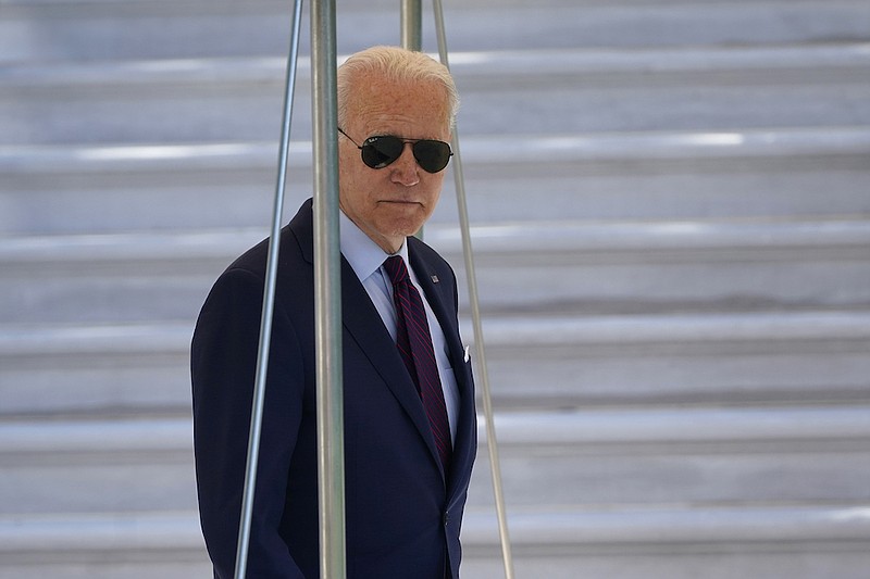 Photo by Susan Walsh of The Associated Press / President Joe Biden walks to Marine One on the South Lawn of the White House in Washington on June 29, 2021.