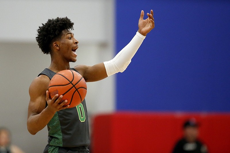 Staff photo by C.B. Schmelter / East Hamilton's Darwin Randolph (0) signals to his team during their game against Cleveland at Cleveland High School's Raider Arena on Friday, Jan. 10, 2020 in Cleveland, Tenn.