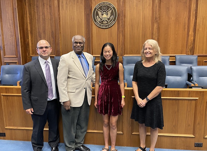 Contributed photo / Lisa Lin, third from left, a rising 10th grader at Signal Mountain High School, is pictured with Travis McDonough, left, chief district judge; Curtis Collier, senior district judge; and Susan Lee, chief magistrate. Lisa is one of two winners of this year's essay contest sponsored by the Eastern District of Tennessee Civics Education and Outreach Committee, which partners with local chapters of the Federal Bar Association.