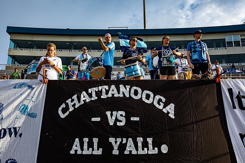 Staff photo by Troy Stolt / The Chattahooligans look toward the field at Chattanooga FC's match against Appalachian FC on Wednesday at Finley Stadium.