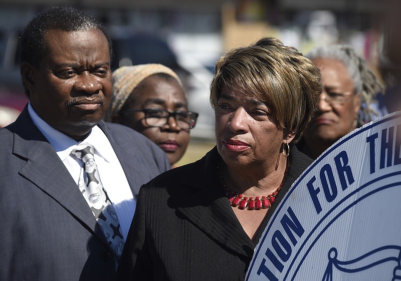 Staff File Photo / Then-Chattanooga City Councilman Yusuf Hakeem, left, and then-state Rep. JoAnne Favors attend a 2015 news conference. Hakeem later replaced Favors in the state legislature.