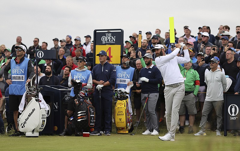 AP photo by Ian Walton / Dustin Johnson tees off on the fourth hole at Royal St. George's Golf Club during a practice round Wednesday ahead of the British Open.