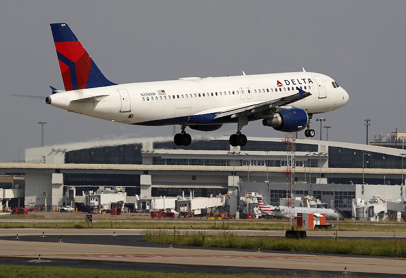 A Delta Airlines aircraft makes its approach at Dallas-Fort Worth International Airport in Grapevine, Texas, in this Monday, June 24, 2019, file photo. Delta Air Lines reported its first quarterly profit since the pandemic devastated the airline industry more than a year ago, as hordes of vacation travelers and money from U.S. taxpayers offset weak corporate and international travel. Delta said Wednesday, July 14, 2021, that it earned $652 million in the second quarter. However, Delta's report shows that airlines still face turbulence as they try to rebound from their worst year ever.(AP Photo/Tony Gutierrez, File)