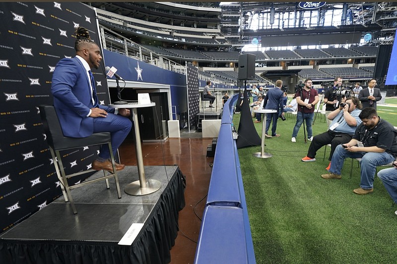 West Virginia defensive lineman Dante Stills speaks during the NCAA college football Big 12 media days Wednesday, July 14, 2021, in Arlington, Texas. (AP Photo/LM Otero)