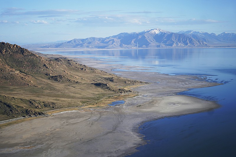 AP Photo by Rick Bowmer / The Great Salt Lake recedes from Anthelope Island on May 4, 2021, near Salt Lake City. The lake has been shrinking for years, and a drought gripping the American West could make this year the worst yet.