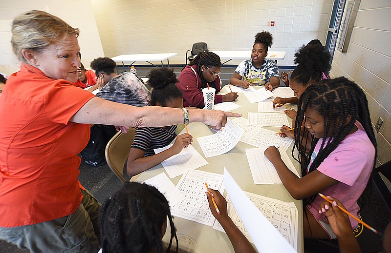 Staff Photo by Matt Hamilton / Jennifer Crutchfield teaches a group of children at the Brainerd Youth and Family Development Center on Thursday, July 15, 2021. 