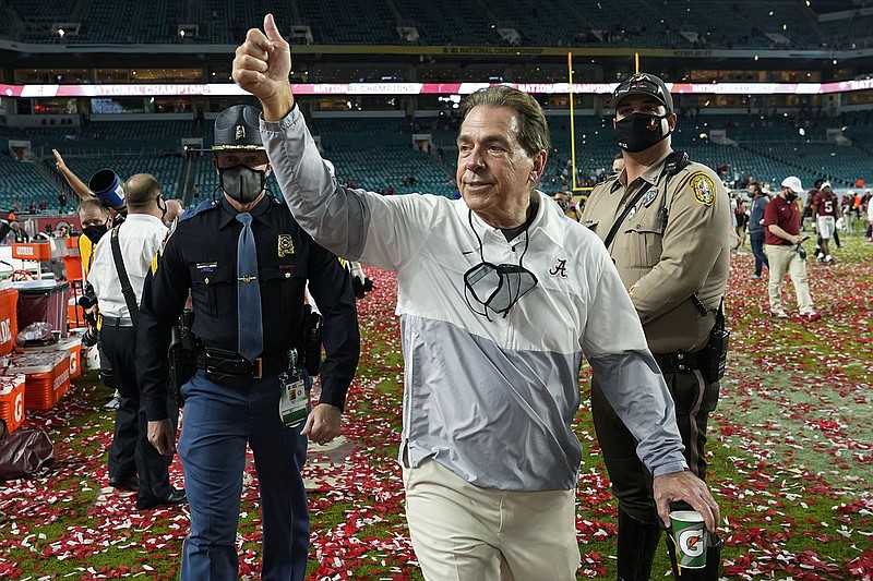 AP photo by Lynne Sladky / Alabama coach Nick Saban leaves the field after his Crimson Tide beat Ohio State in the College Football Playoff national title game this past January. Saban's Tide and the Georgia Bulldogs are expected to be picked to win their divisions at SEC Media Days next week in Hoover, Ala.