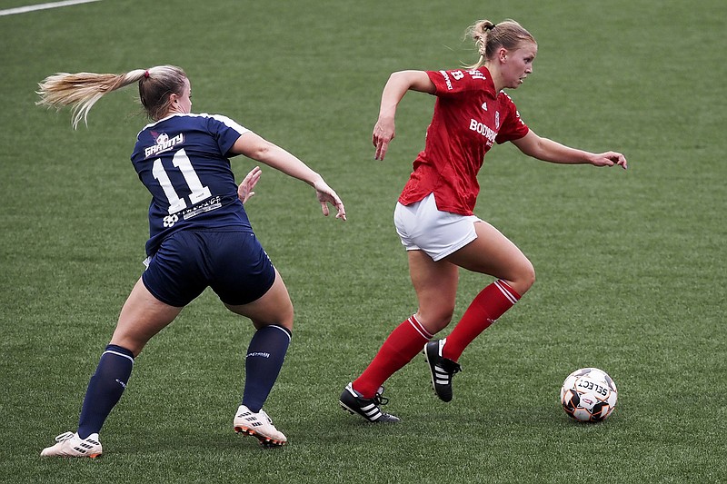 Staff file photo / Mackenzie Smith, right, scored to help the Chattanooga Lady Red Wolves rally to beat the host Nashville Rhythm FC on Sunday night.