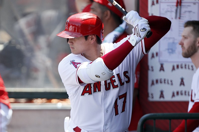 Los Angeles Angels designated hitter Shohei Ohtani prepares to hit against the Seattle Mariners during the third inning of a baseball game in Anaheim, Calif., Sunday, July 18, 2021. (AP Photo/Alex Gallardo)