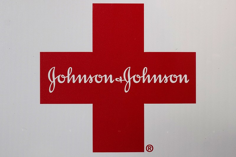 FILE - In this Feb. 24, 2021, file photo, Johnson & Johnson logo appears on the exterior of a first aid kit in Walpole, Mass. The three biggest U.S. drug distribution companies and the drugmaker Johnson & Johnson are on the verge of a $26 billion settlement covering thousands of lawsuits over the toll of opioids across the U.S., two people with knowledge of the plans told The Associated Press. The settlement involving AmerisourceBergen, Cardinal Health and McKesson is expected this week. A $1 billion-plus deal involving the three distributors and the state of New York was planned for Tuesday, July 20.   (AP Photo/Steven Senne, File)