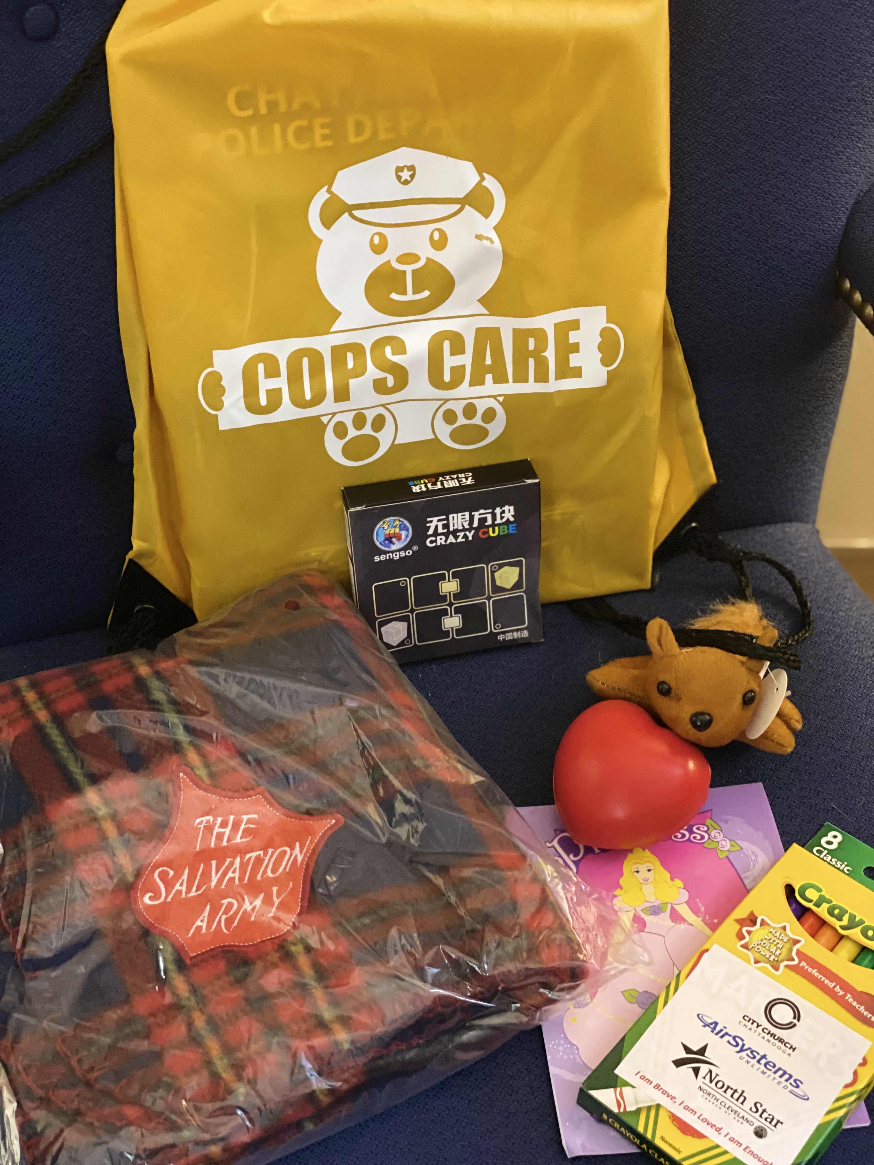 Photo contributed by the Chattanooga Police Department / A "Cops Care" care package is pictured on Wednesday, July 21, 2021. The "Cops Care" program collaboration between Unum and the Chattanooga Police Department will provide bags to children at police scenes in an attempt to bring comfort and a distraction. The kits will include items such as a blanket, a stress ball, stuffed animals and coloring books.