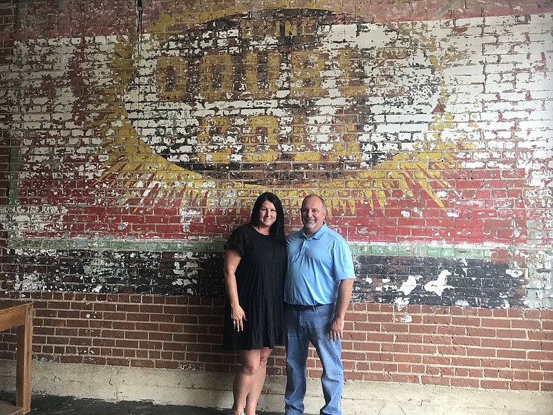 Photo by Emily Crisman / Brian and Kim Carlock are opening That Axe Throwing Place in the Mars Theatre District in Lafayette, Georgia.