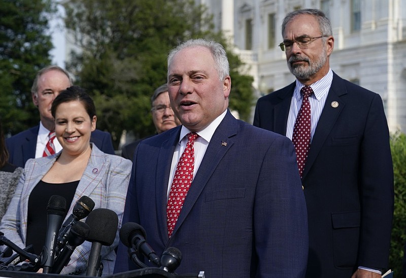 House Minority Whip Steve Scalise, R-La., joined by House Republican Conference Chair Elise Stefanik, R-N.Y., left, and members of the GOP Doctors Caucus, speaks during a news conference about the Delta variant of COVID-19 and the origin of the virus, at the Capitol in Washington, Thursday, July 22, 2021. (AP Photo/J. Scott Applewhite)


