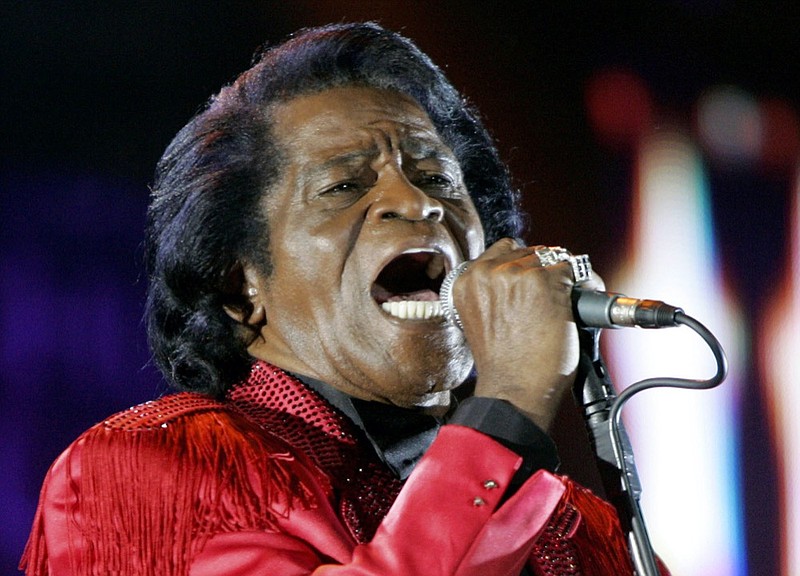 FILE - In this July 6, 2005 file photo, James Brown performs on stage during the Live 8 concert at Murrayfield Stadium in Edinburgh, Scotland. (AP Photo/Matt Dunham, File)


