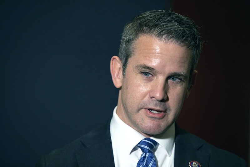 FILE - In this May 12, 2021 file photo, Rep. Adam Kinzinger, R-Ill., speaks to the media at the Capitol in Washington. House Speaker Nancy Pelosi said Sunday, July 25 she intends to name Kinzinger to a congressional committee investigating the violent Jan. 6 Capitol insurrection, pledging that the panel will "find the truth" even as the GOP threatens to boycott the effort. (AP Photo/Amanda Andrade-Rhoades, File)

