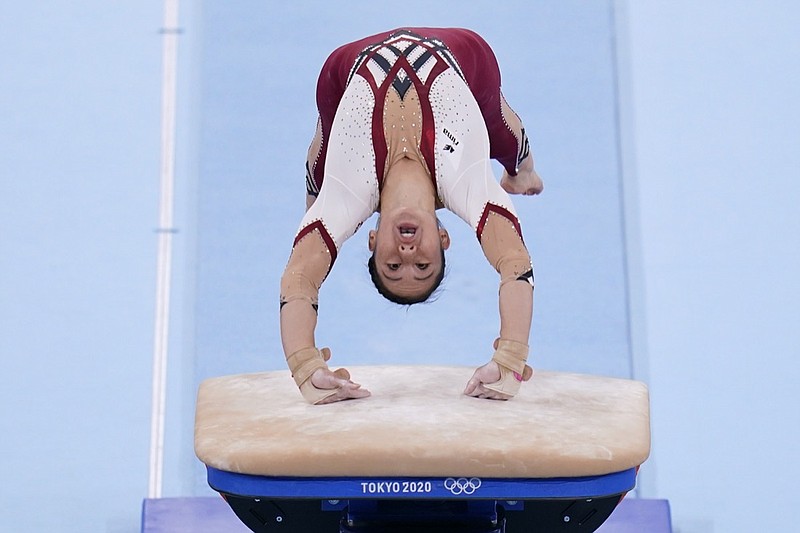 Kim Bui, of Germany, performs on the vault during the women's artistic gymnastic qualifications at the 2020 Summer Olympics, Sunday, July 25, 2021, in Tokyo. (AP Photo/Gregory Bull)

