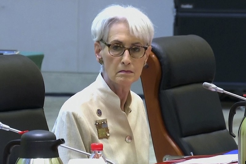 In this image taken from a July 26, 2021, video footage run by Phoenix TV via AP Video, U.S. deputy secretary of state Wendy Sherman looks up before talks with Chinese officials at the Tianjin Binhai No. 1 Hotel in the Tianjin municipality in China. China came out swinging at high-level face-to-face talks with the United States on Monday, blaming the U.S. for a "stalemate" in bilateral relations and calling on America to change "its highly misguided mindset and dangerous policy." (Phoenix TV via AP Video)