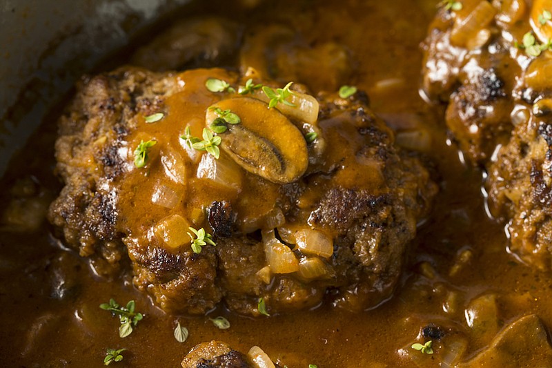 Homemade savory salisbury steaks. / Photo credit: Getty Images/iStock/bhofack2