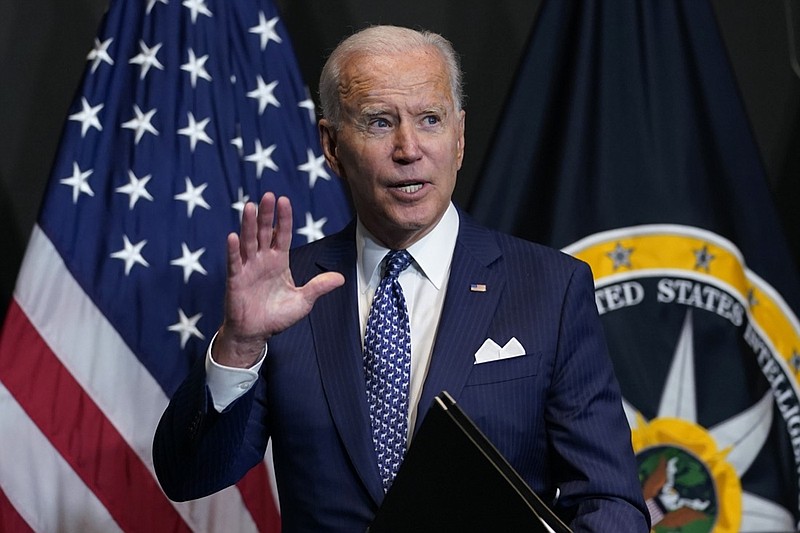 President Joe Biden finishes leaves after speaking during a visits to the Office of the Director of National Intelligence in McLean, Va., Tuesday, July 27, 2021. This is Biden's first visit to an agency of the U.S. intelligence community. (AP Photo/Susan Walsh)

