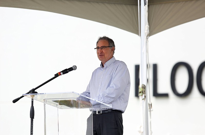 Staff photo by Erin O. Smith / Jeff Lorberbaum, the chairman and chief executive officer of Mohawk Industries, speaks during a flag raising event at Mohawk Industries Wednesday, June 19, 2019 in Calhoun, Georgia. Mohawk raised the largest American flag in Georgia Wednesday.