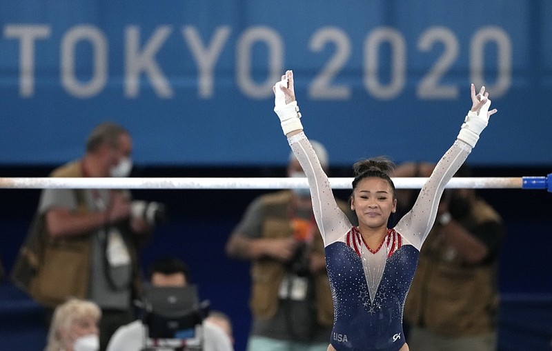 AP photo by Ashley Landis / U.S gymnast Sunisa Lee finishes her performance on the uneven bars during the women's all-around final Thursday at the Tokyo Olympics. She won the event, becoming the fifth straight American woman to earn gold in the all-around event.