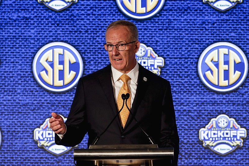 AP photo by Butch Dill / Southeastern Conference commissioner Greg Sankey speaks to reporters during SEC Media Days on July 19 in Hoover, Ala.