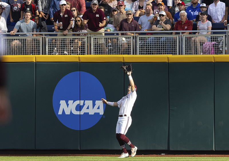 AP photo by Rebecca S. Gratz / Mississippi State right fielder Tanner Allen catches a fly ball during a College World Series game against Texas on June 26 at TD Ameritrade Park in Omaha, Neb.