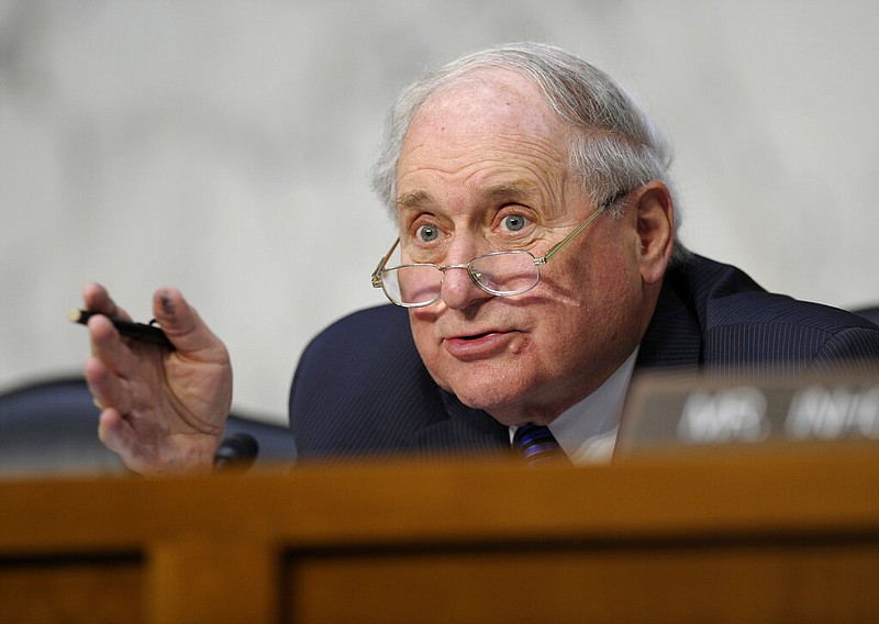 In this June 4, 2013, file photo, Senate Armed Services Committee Chairman Sen. Carl Levin, D-Mich. asks a question of a witness during a hearing on Capitol Hill in Washington on legislation regarding sexual assaults in the military. Former Sen. Carl Levin, a powerful voice for the military during his career as Michigan's longest-serving U.S. senator, has died. The Democrat was 87. Levin's family says Levin died Thursday, July 29, 2021. (AP Photo/Susan Walsh, File)