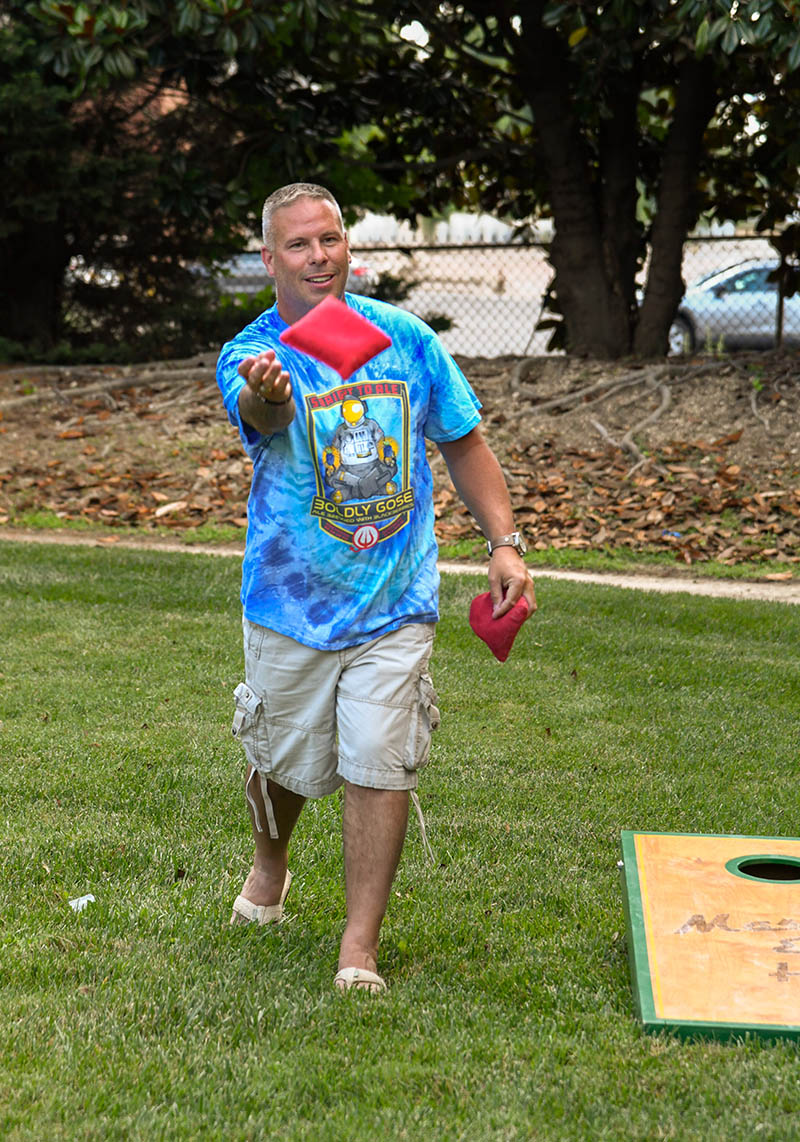 Photo by Mark Gilliland / Brian Buetow plays cornhole.