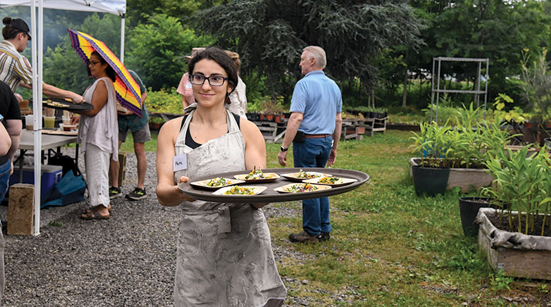 Photo by Mark Gilliland / Meira Shuman takes out the first course.