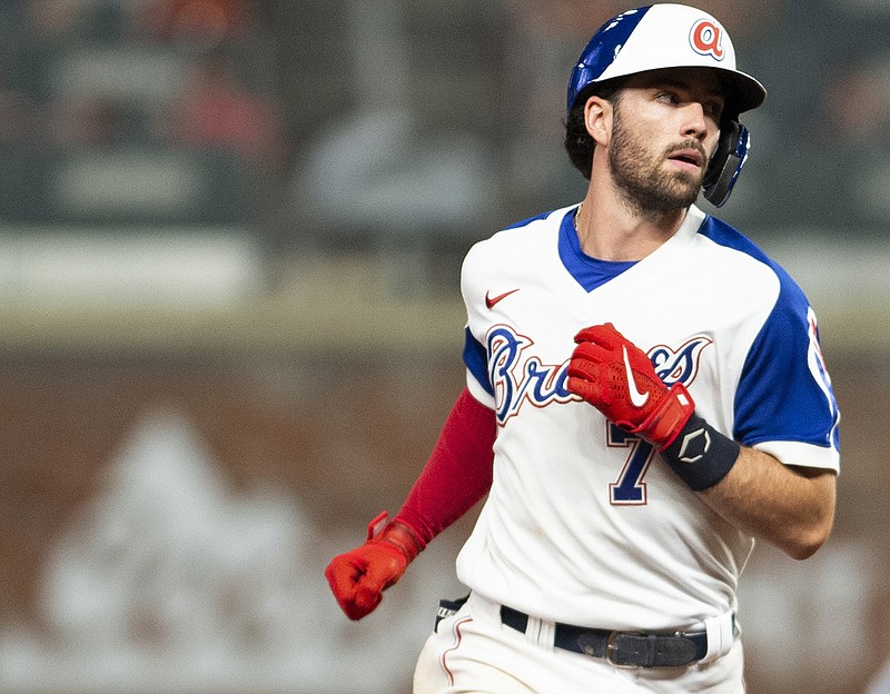 Dansby Swanson has seven RBIs as Braves roll by Brewers