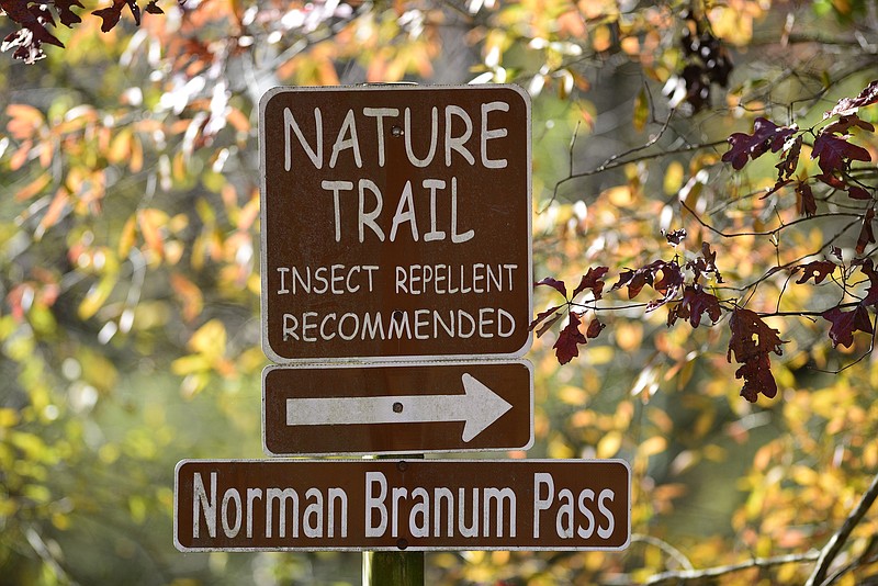 Staff file photo by Robin Rudd / A sign marks a nature trail at Camp Jordan Park in East Ridge. Outdoor activities, particularly in warmer weather, require being aware of pests such as ticks, arachnids that suck the blood of their hosts and can pass on disease in the process. Repellents and clothing can help hunters, hikers and others avoid such bites, and thorough body checks after being outdoors are also important to remove any ticks.