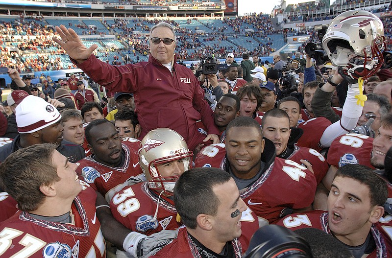 In this Jan. 1, 2010, file photo, Florida State head coach Bobby Bowden is carried on the shoulders of his players after their 33-21 win over West Virginia in the Gator Bowl NCAA college football game in Jacksonville, Fla. Bowden, the folksy Hall of Fame coach who built Florida State into an unprecedented college football dynasty, has died. He was 91. Bobby's son, Terry, confirmed to The Associated Press that his father died at home in Tallahassee, Fla., surrounded by family early Sunday, Aug. 8, 2021. (Bob Self/The Florida Times-Union via AP, File)