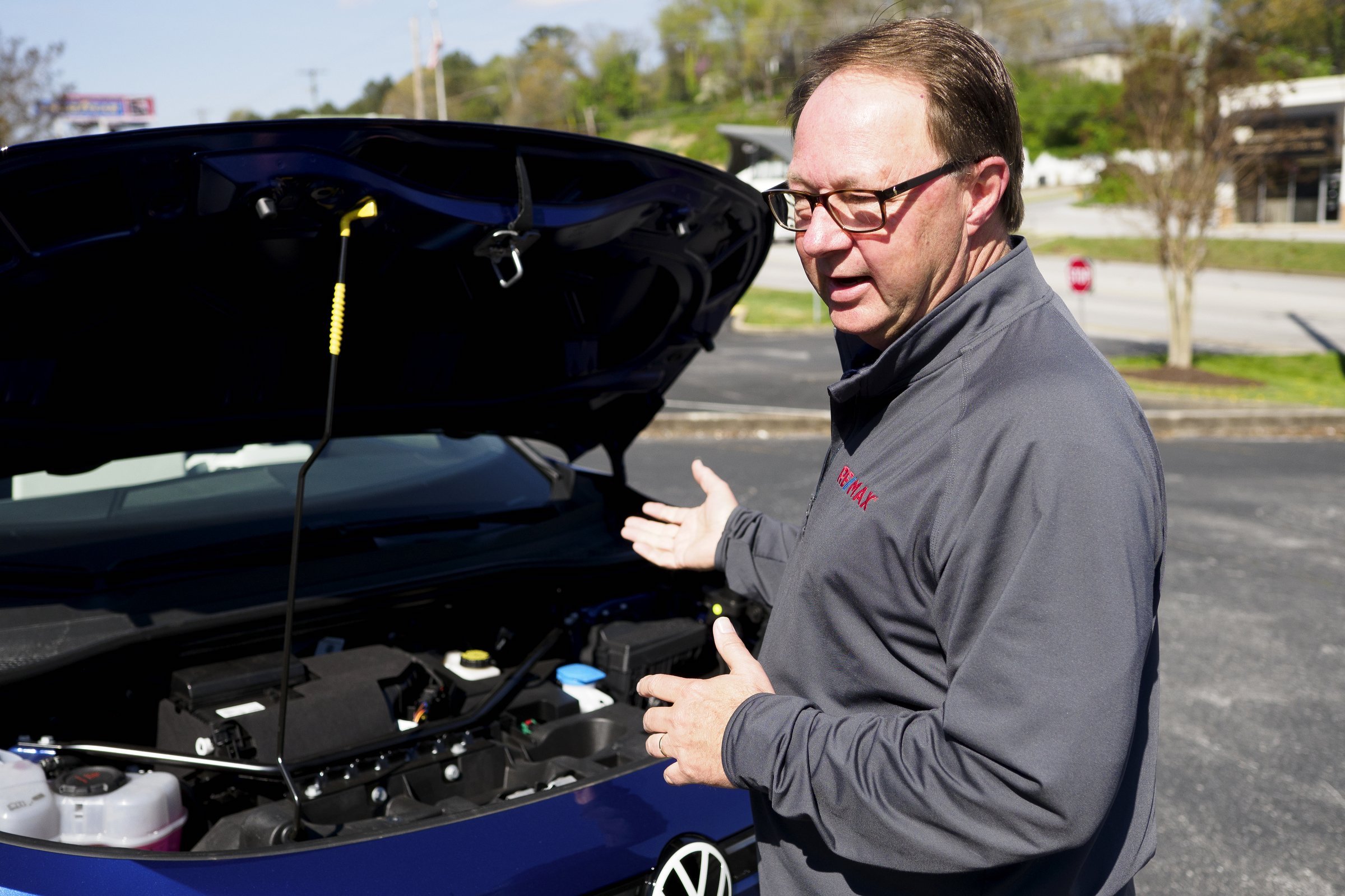 Staff photo by C.B. Schmelter / Mike Purcell shows his Volkswagen ID.4 to the Times Free Press at ReMax Renaissance on Tuesday, March 30, 2021 in Chattanooga, Tenn. Purcell is one of the first in Chattanooga to own the ID.4.