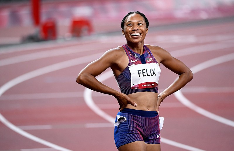 USA's Allyson Felix is all smiles after winning the bronze medal in the 400m race at the Tokyo Olympics. / Photo by Wally Skalij/Los Angeles Times/TNS