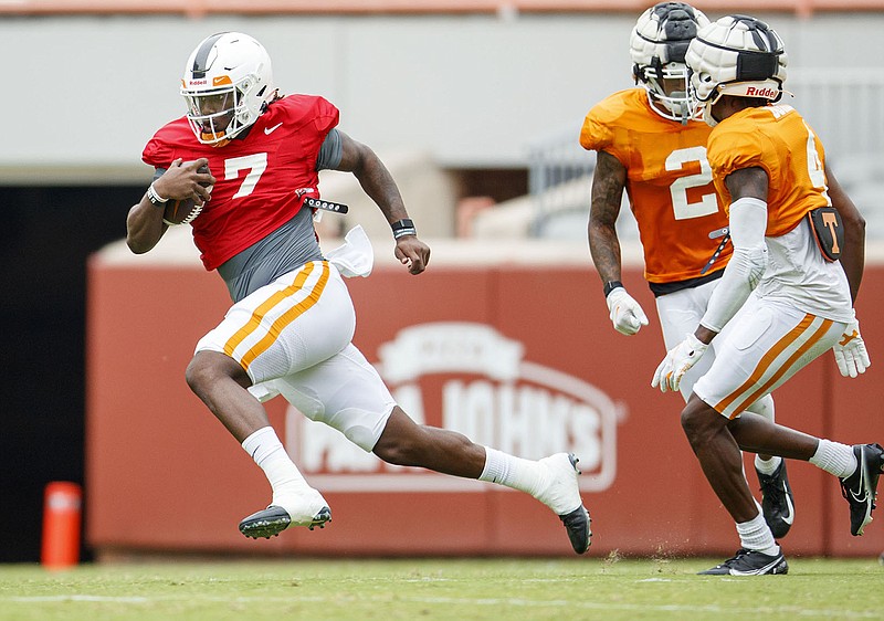 Tennessee Athletics photo by Caleb Jones / Tennessee quarterback Joe Milton scrambles for yardage during Thursday's first preseason scrimmage inside Neyland Stadium. Thursday also marked the first time Milton, a graduate transfer from Michigan, scrimmaged with the Volunteers.