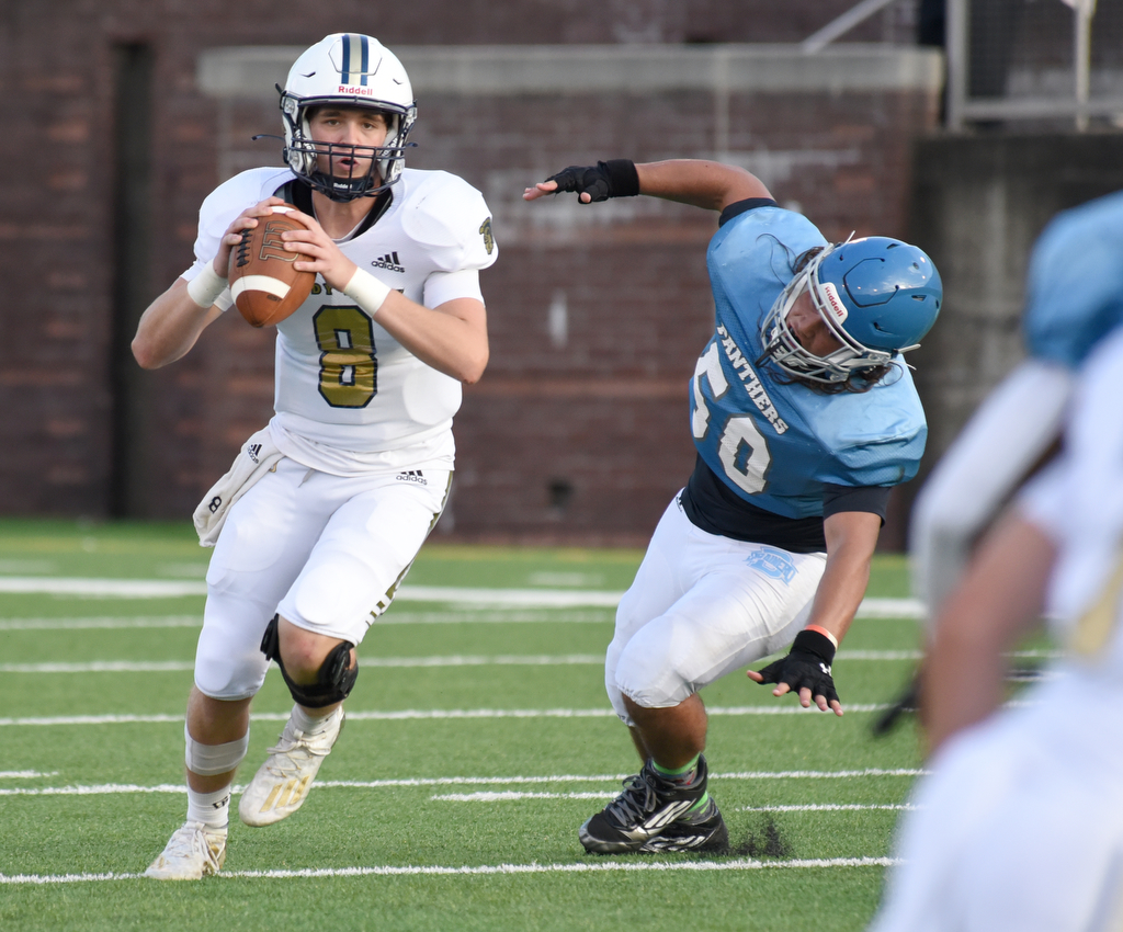 Staff Photo by Matt Hamilton / Soddy Daisy (8) Slater Hickman scrambles as Brainerd (50) Xavier Wood gives chase Friday. Eight local football teams squared off in eight different 20-minute games Friday, August 13, 2021 at Finley Stadium.