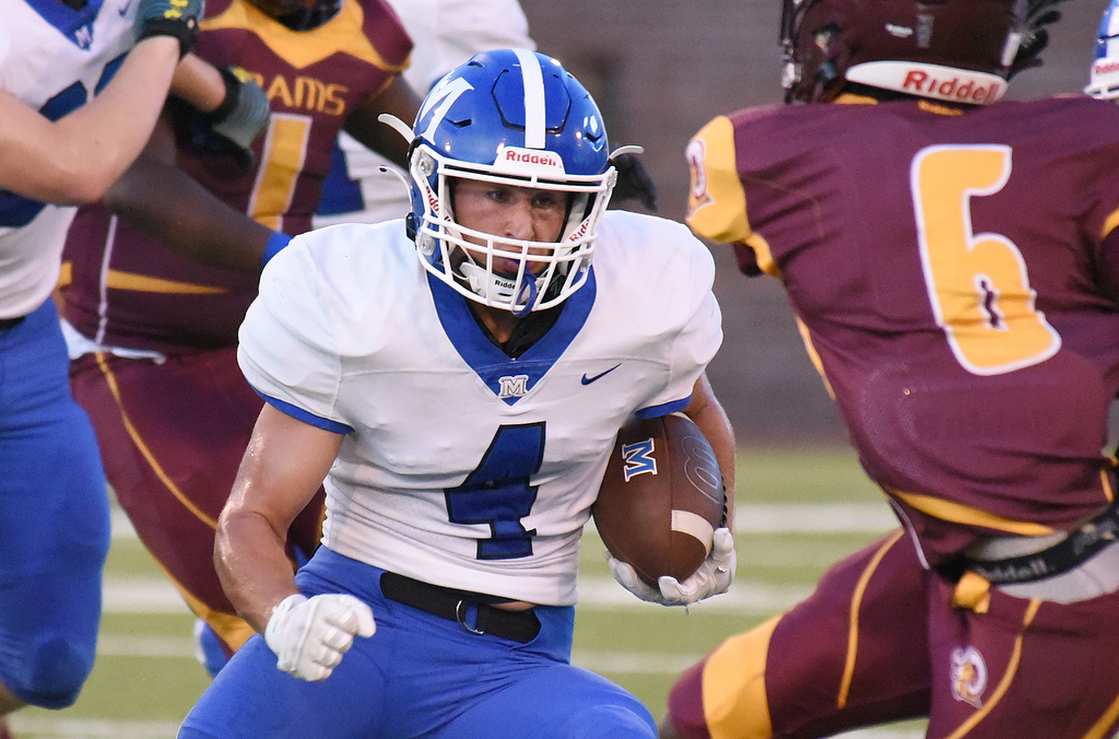 Staff photo by Matt Hamilton / McCallie's Weston Hammond carries the ball against Tyner during the Best of Preps Jamboree at Finley Stadium. McCallie beat Tyner 14-0 in the scrimmage quarter and also won 16-0 against Cleveland.