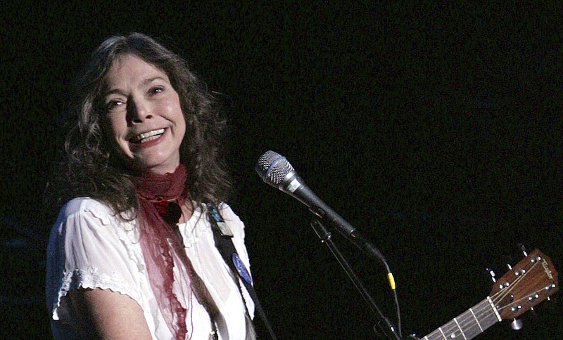 Nanci Griffith performs during the ACLU Freedom Concert Oct. 4, 2004, in New York. Griffith, the Grammy-winning folk singer-songwriter from Texas whose literary songs like "Love at the Five and Dime" celebrated the South, has died. She was 68. A statement from her management company on Friday, Aug. 13, 2021, confirmed her death, but no cause of death was provided. (AP Photo/Julie Jacobson, File)