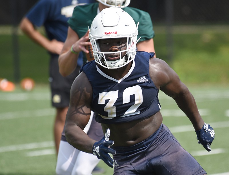 Staff photo by Matt Hamilton / UTC running back Ailym Ford, shown during the Mocs' Aug. 4 practice at Scrappy Moore Field, was forced to slow down by injuries after an impressive freshman season in 2019.