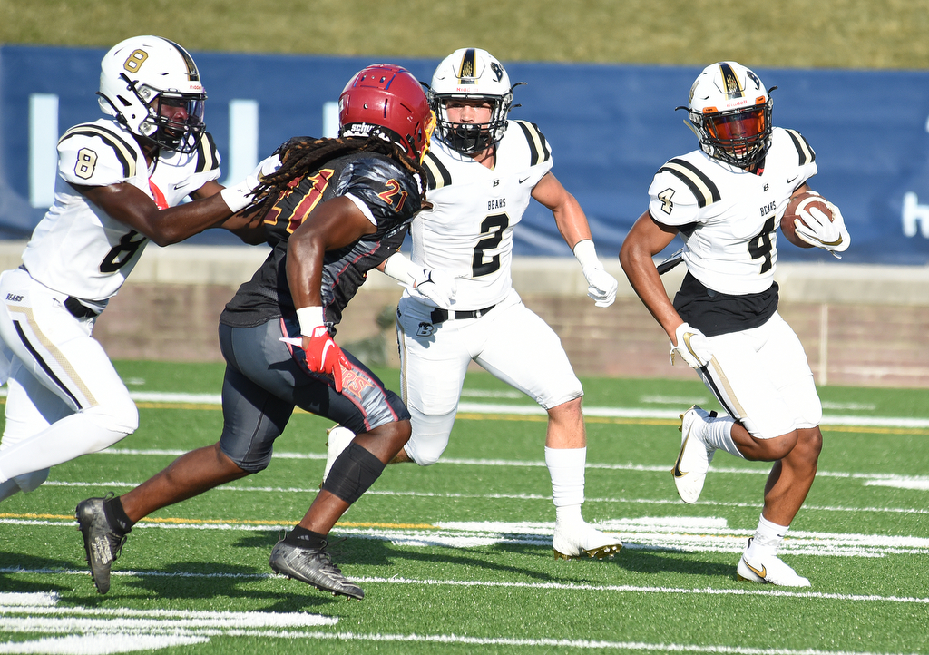 Staff Photo by Matt Hamilton / Bradley Central (4) J'Alan Terry breaks into the open against Howard Saturday. Eight local football teams squared off in eight different 20-minute games Saturday August 14, 2021 at Finley Stadium.