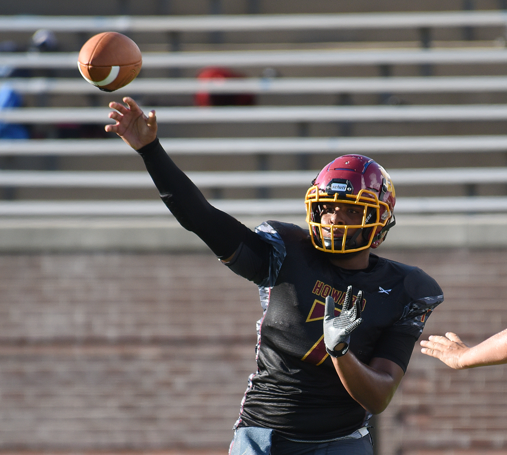 Staff Photo by Matt Hamilton / Howard (7) Chris Beasley tosses the ball Saturday. Eight local football teams squared off in eight different 20-minute games Saturday August 14, 2021 at Finley Stadium.