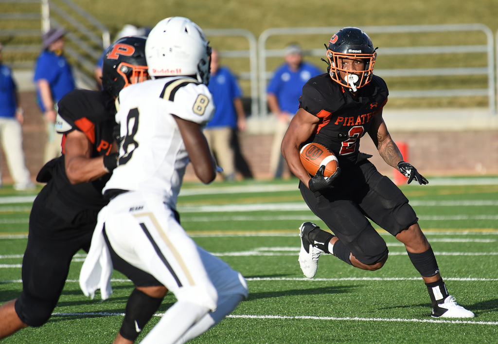 Staff Photo by Matt Hamilton / South Pittsburgh (2) De'Andre Kelly carries the ball Saturday against Bradley Central. Eight local football teams squared off in eight different 20-minute games Saturday August 14, 2021 at Finley Stadium.