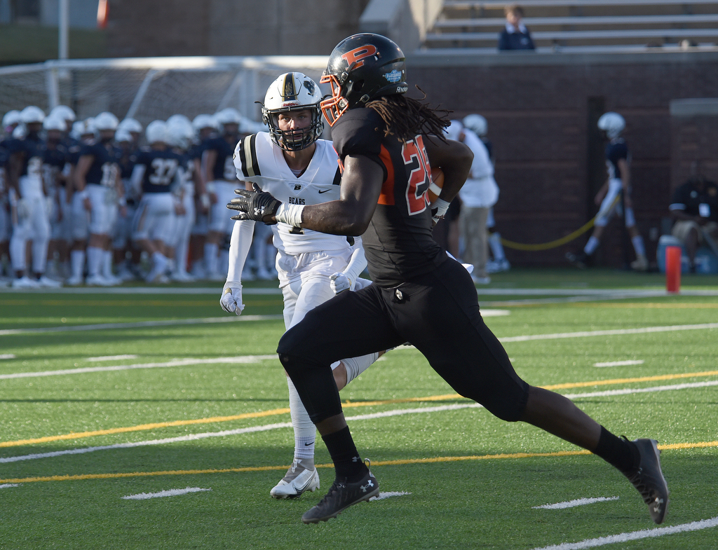 Staff Photo by Matt Hamilton / South Pittsburgh (28) Reginald Hunter carries the ball for a touchdown Saturday against Bradley Central. Eight local football teams squared off in eight different 20-minute games Saturday August 14, 2021 at Finley Stadium.